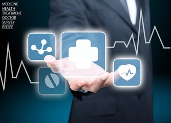 Wall Mural - Businessman hand holding virtual medical health care icons. People health care awareness, life insurance business.