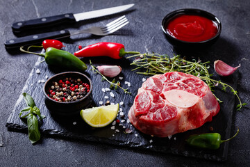 Canvas Print - raw osso buco, veal shank steak on stone board