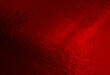 Red foil background with uneven texture