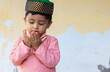 © Photix Studio - Muslim kid boy praying