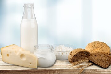 Wall Mural - Jewish holiday Shavuot concept with dairy products on the desk