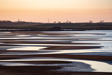 Wall Mural - tidal beach flats, view to point Sampson