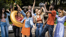Many Multiethnic Young People Having Fun Dancing Music Outside In The Garden - Millennials Generation - Youth Culture Lifestyle Concept