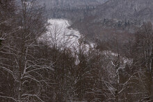 View From Above Of Gauja River And Snow-covered Forests In Sigulda, Latvia. Winter Landscape. Gaujas National Park.