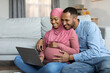 © Prostock-studio - Loving Black Islamic Spouses Expecting Baby Using Laptop At Home