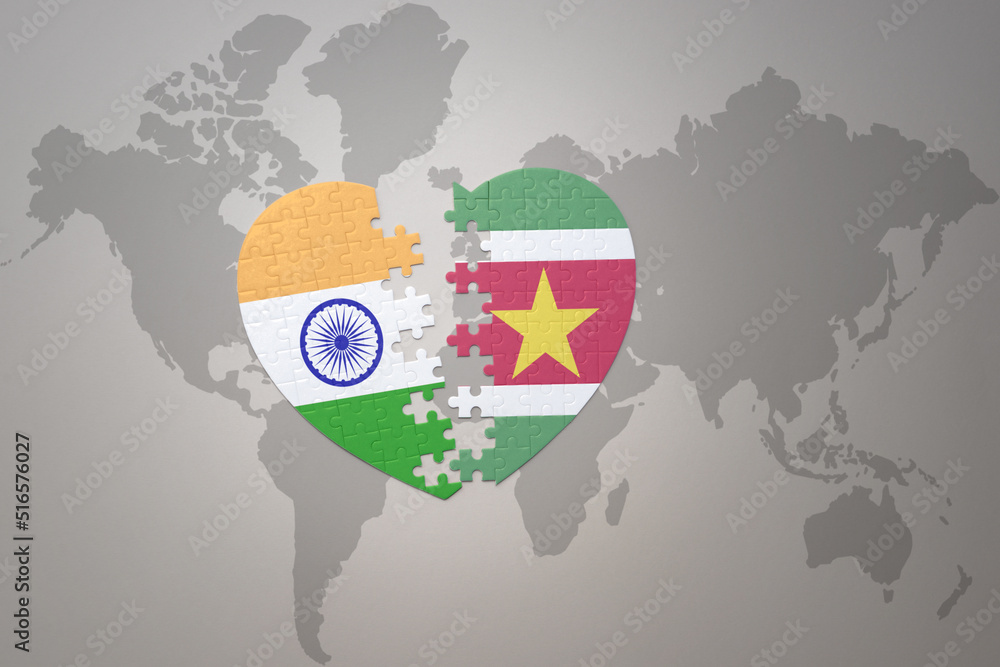 puzzle heart with the national flag of india and suriname on a world ...