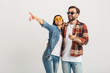 Wall Mural - stylish man and woman in casual denim hipster outfit having fun