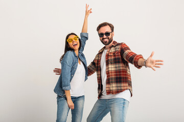 Wall Mural - stylish man and woman in casual denim hipster outfit having fun