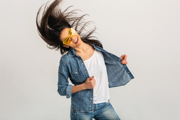 Wall Mural - attractive smiling happy woman dancing waving long hair