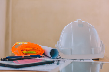 White helmet hard hat safety for safety work and equipment on desk office, Engineering Engineer safety in work