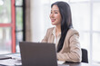 © David - Portrait of Young woman using laptop computer at the office, Student girl working at home. Work or study from home, Asian woman freelance, business, lifestyle concept