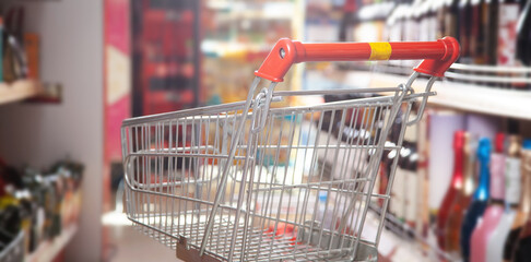 Shopping cart in supermarket. Food shop