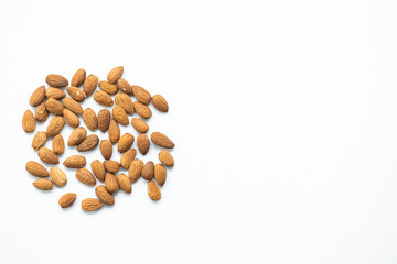 Wall Mural - Almonds isolated on white.