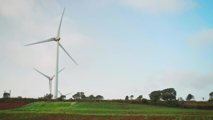 Wall Mural - Wind electric generator. Large wind turbines against evening sky. Wind park agricultural farm. Alternative energy eco nature. sustainable energy Ecological 