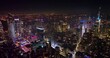 Immense New York panorama at night time. Tremendous city scenery in lights with dark river crossing the city. Top view.