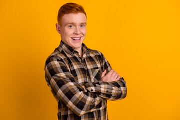 Poster - Profile side photo of young handsome man folded hands clever economist promoter isolated over yellow color background