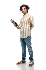 Wall Mural - technology and people concept - happy young man in glasses with tablet pc computer showing thumbs up gesture over white background