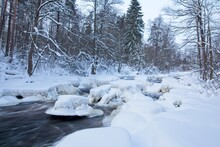 Winter View Of Rapids With Snow And Ice At Nukarinkoski, Nurmijärvi, Finland.