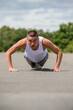 © Ben Gingell - A Nineteen Year Old Teenage Boy Doing Push Ups A Public Park