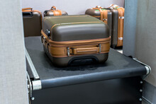 Tourist Suitcases or luggages are conveying through conveyor  belt at airport arrivals terminal,  Airline business
