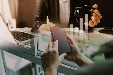 Businesswoman working with smart phone and laptop and digital tablet computer in office with digital marketing media in virtual icon