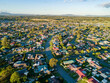 © Austockphoto - Aerial photo of neat houses in afternoon light in Hunterview
