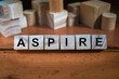 Aspire Word Written In Wooden Cube