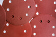 Many Round sandpaper discs with Velcro, top view