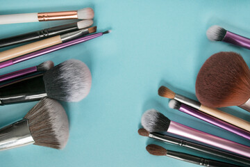 Wall Mural - Makeup brushes on blue