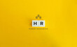 HR (Human Resources) Banner and Concept. Text on Block Letter Tiles on Yellow Orange Background. Minimal Aesthetics.