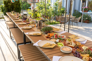 Food served outdoor on a long table