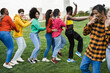 © DisobeyArt - Group of multiracial people dancing together outdoor - Focus on girl wearing pink shirt
