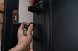 The master installs the core for the door lock, installation work with the door.