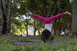 © Amilciar - Latin American girl having fun in the park doing gymnastic exercises with dexterity.