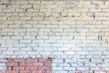 Wall Mural - Texture surface of an old red brick building wall painted with white paint.