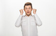 © serhii - close-up portrait of a man in a white shirt on a white background isolated.portrait of a man with different emotions isolated.