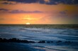 Sunrise on Folly beach with orange sky in South Caroline