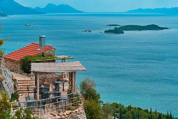 Sticker - Beautiful view of a house and a sea with an island in Peljesac, Croatia