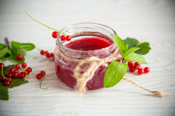 Canvas Print - sweet summer jam from ripe red currants in a jar