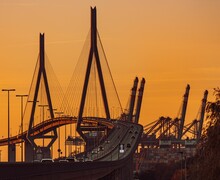 Beautiful Shot Of The Busy Kohlbrand Bridge During A Golden Sunset  In Hamburg, Germany