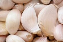 Closeup Of Garlic Cloves At Market
