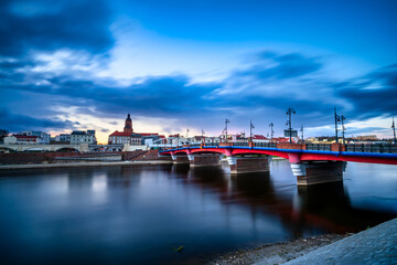 Wall Mural - Old town bridge and St. Marys cathedral in Gorzow Wielkopolski at sunset. Poland