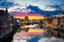 The City Of York In England With Its Ouse River Canal At Sunset