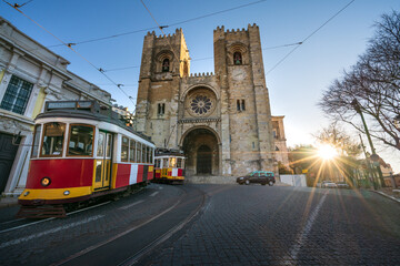 Sticker - Lisbon city old town with famous Santa Maria cathedral at sunrise. Portugal