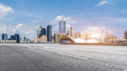 Canvas Print - Urban road ground and modern architectural landscape