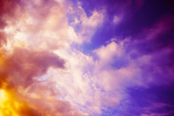 Wall Mural - yellow orange pink purple sunset. beautiful evening sky with clouds. background with space for desig