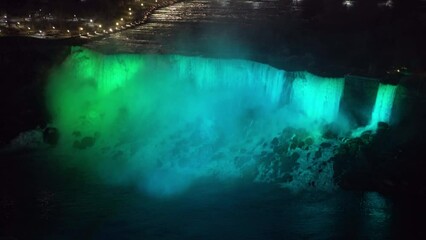 Wall Mural - Aerial view of Niagara Falls American Falls winter illumination in twilight time. Stunning landscape dusk to night.