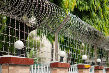 Barbed wire, also known as barb wire