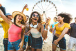Multiracial group of friends having fun dancing on the beach - Happy people enjoying music festival on weekend vacation - Joyful tourists celebrating summer holiday together - Youth lifestyle concept