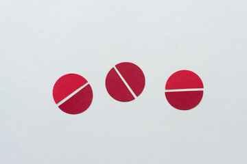 Poster - three paper shapes or semi circles acting as balls